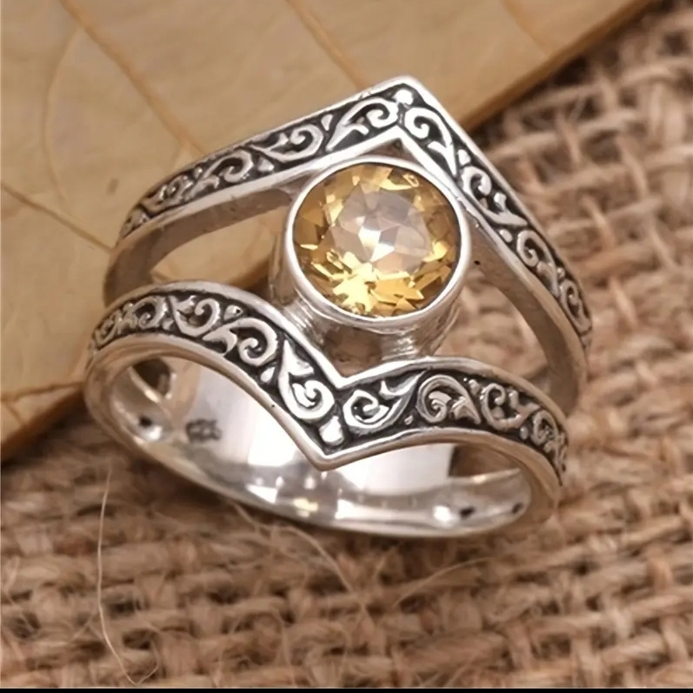 Elegant Silver Ring with Gold Gemstone